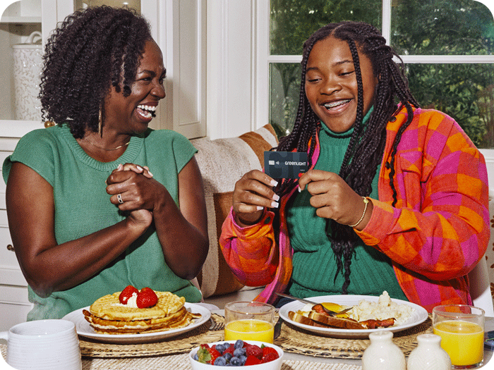 Family at Breakfast with new credit card